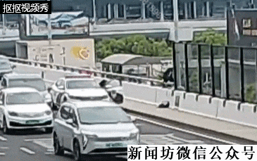 上海虹桥机场附近，一男子爬上高架轻生！千钧一发之际，有民警经过...