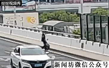 上海虹桥机场附近，一男子爬上高架轻生！千钧一发之际，有民警经过...