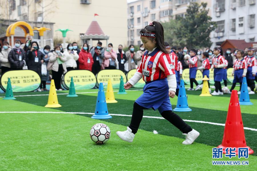 Children play football at kindergarten in Anhui Children play football at kindergarten in Anhui