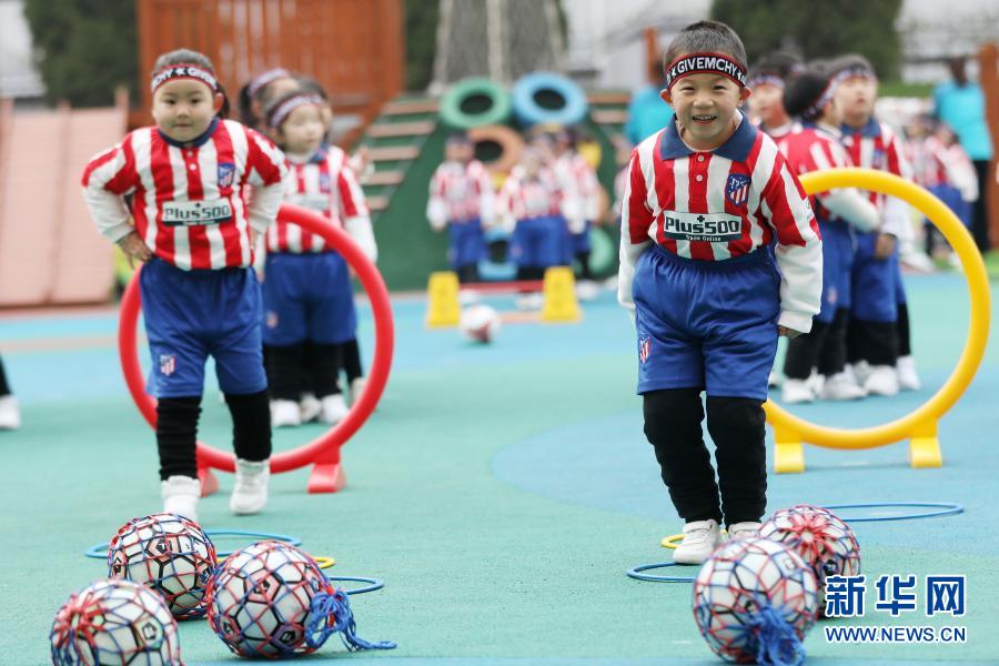 Children play football at kindergarten in Anhui Children play football at kindergarten in Anhui