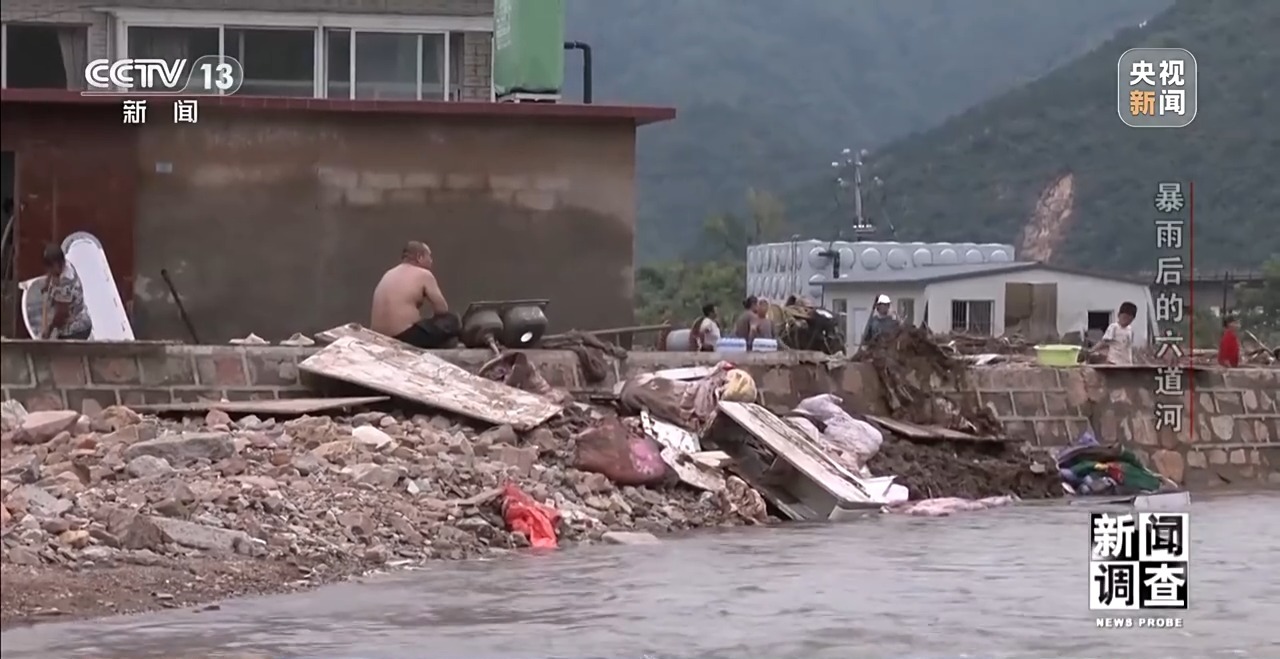 攀90°绝壁、蹚过激流 救援队抵达河北失联村开展救援