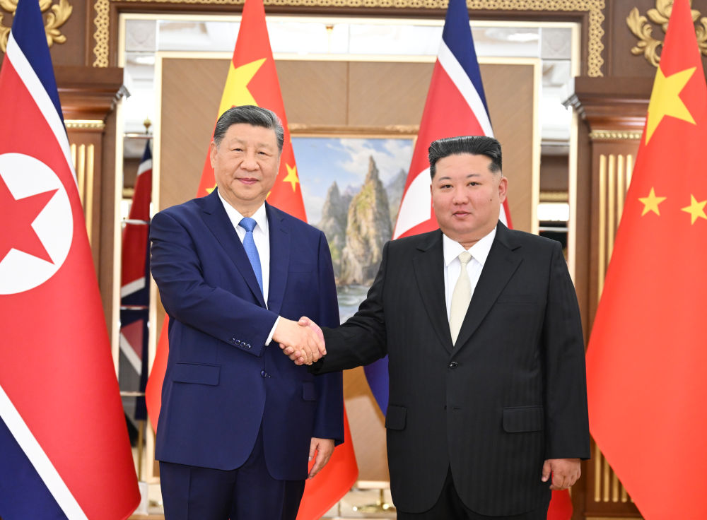 习近平同金正恩举行会谈 习近平同金正恩举行会谈