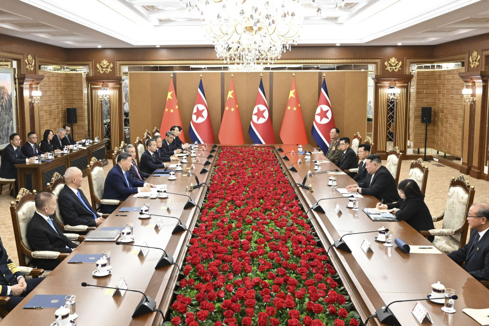 习近平同金正恩举行会谈 习近平同金正恩举行会谈