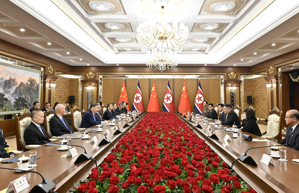 习近平同金正恩举行会谈 习近平同金正恩举行会谈