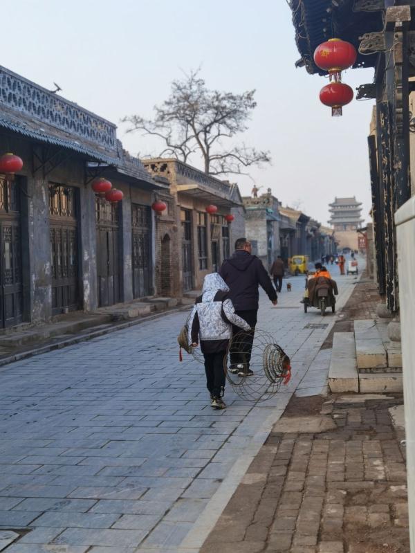 新华全媒+丨看不完的古城变迁 品不尽的薪火相传——新春之际访平遥
