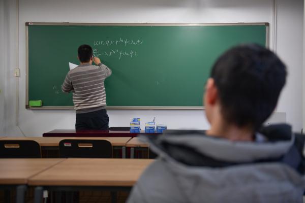 北京:轮椅上的清华博士 北京:轮椅上的清华博士