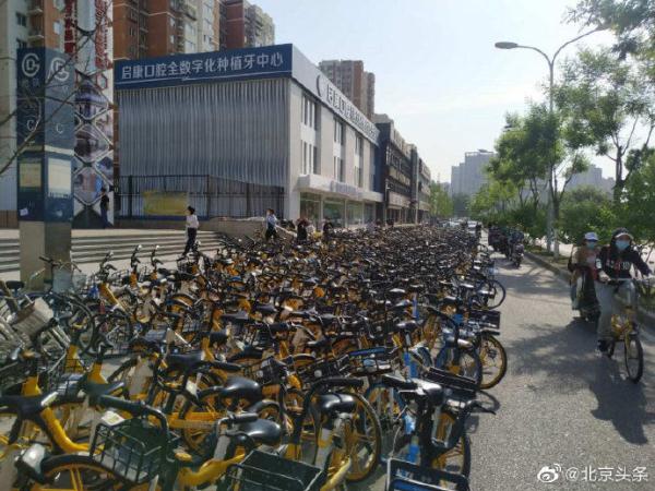 北京节后首日通勤现骑行热 共享单车运维压力剧增