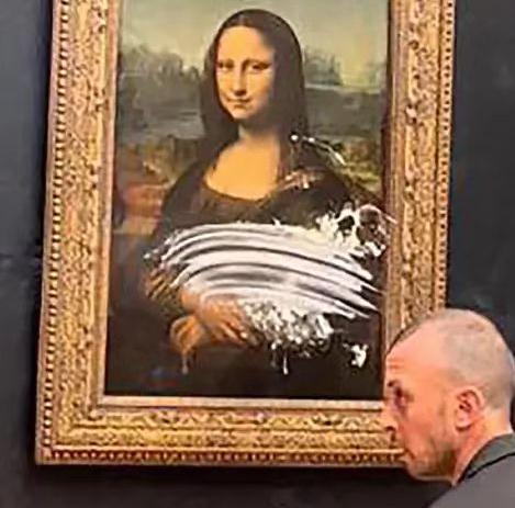 突发！达·芬奇名画《蒙娜丽莎》被人抹了蛋糕