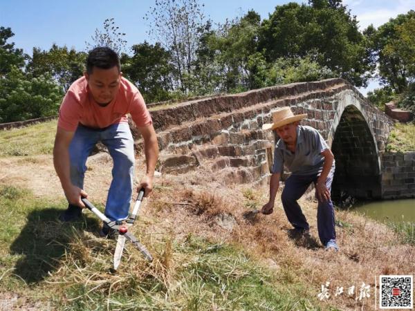 武汉673年古桥藏身这里，他们一家在守护