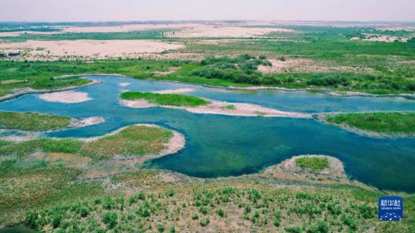 新华全媒+丨新疆:“三山两盆”孕育湿地之美