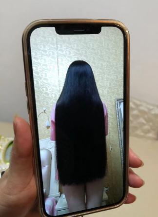 蓄了10年的长发一朝变“鸡窝”！女子怀疑有人故意使坏，商家解释称……