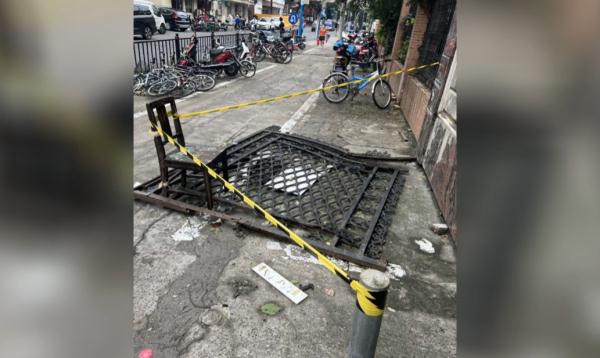 小区大门被风刮得少半扇，居民意见分歧，快过年了咋办？