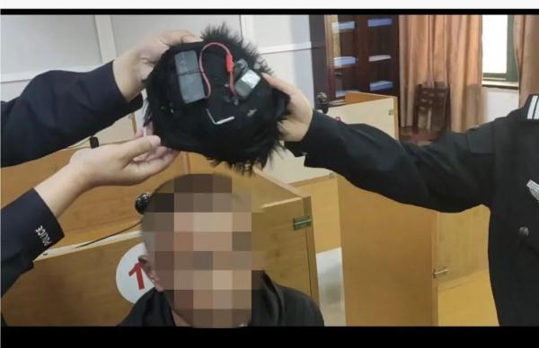 离谱！科目一考场，他头戴假发藏针孔摄像头作弊……