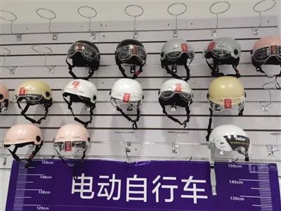 新标准实施后，骑电动车戴旧头盔会被罚吗？
