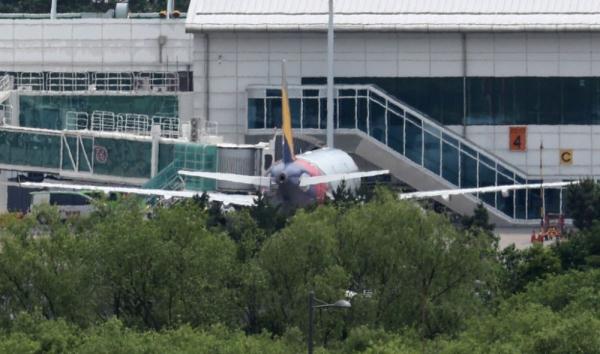 降落前开舱门 韩亚航空一乘客被捕