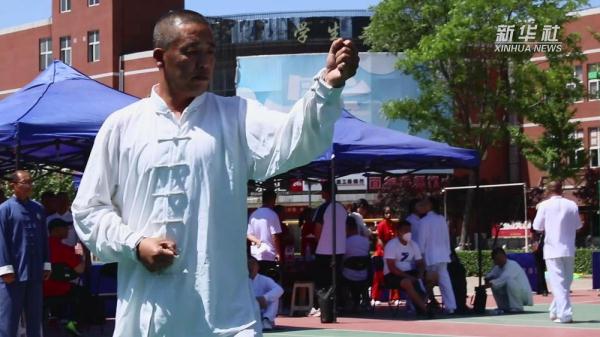 上千“武友”切磋武艺 共商体育非遗发展大计