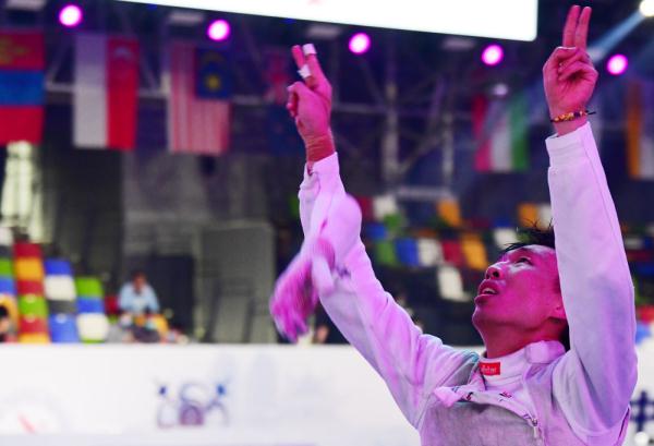 莫梓维突破自我 中国男花队注入“强心剂” 莫梓维突破自我 中国男花队注入“强心剂”