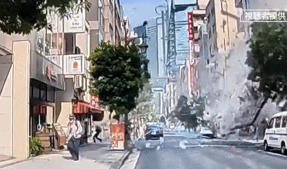 日本东京大楼爆炸瞬间：门窗和大量碎片飞出 有人高喊“快逃”