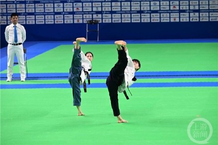 刘思玥、梁婕夺得跆拳道品势混双金牌 系重庆选手首金 刘思玥、梁婕夺得跆拳道品势混双金牌 系重庆选手首金