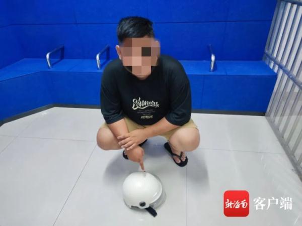 两男子偷头盔被拍下全程,海口警方:行拘5日 两男子偷头盔被拍下全程,海口警方:行拘5日