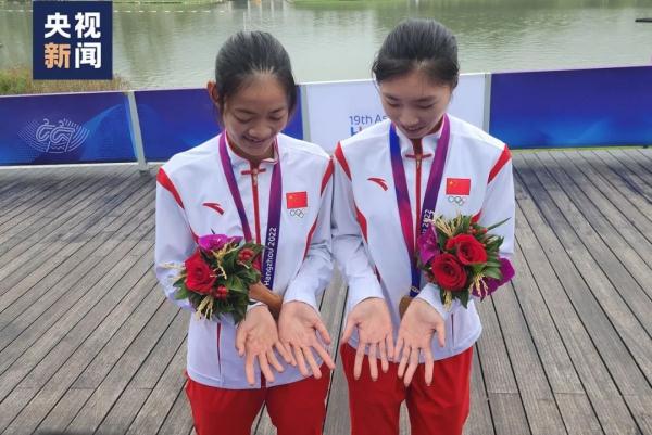 夺得首金的姑娘，有这样一双手……