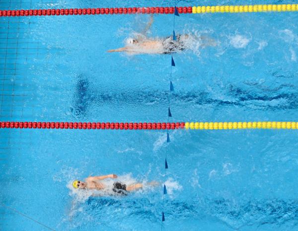 杭州亚运会 | 中国选手包揽游泳男子50米仰泳冠亚军