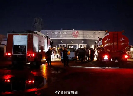 伊拉克一婚礼发生火灾致100死 救护车聚集在医院附近
