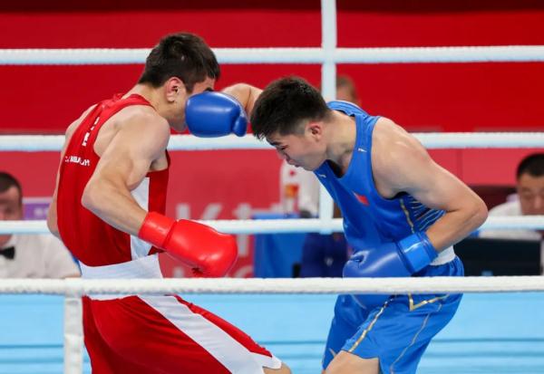 中国拳手托合塔尔别克•唐拉提汗晋级男子80公斤级决赛 中国拳手托合塔尔别克•唐拉提汗晋级男子80公斤级决赛