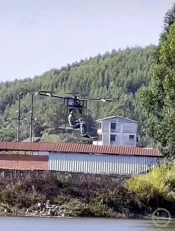 广西一小伙改装无人机当“私人飞机”，当地警方回应