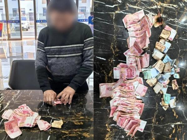 摩托车突发自燃,百元大钞撒一地 摩托车突发自燃,百元大钞撒一地