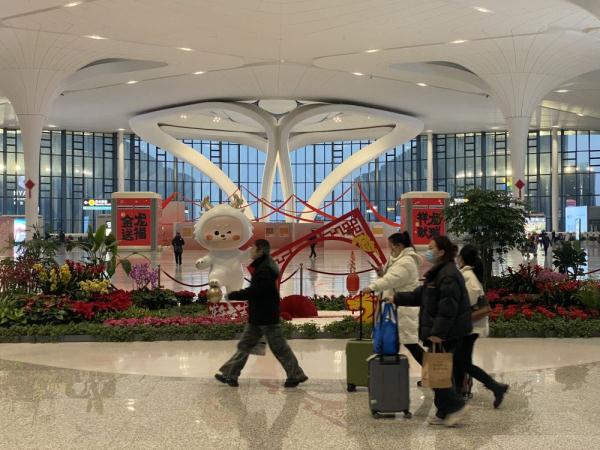 国际航班多 客运保障忙——杭州萧山国际机场春运一线见闻 国际航班多 客运保障忙——杭州萧山国际机场春运一线见闻