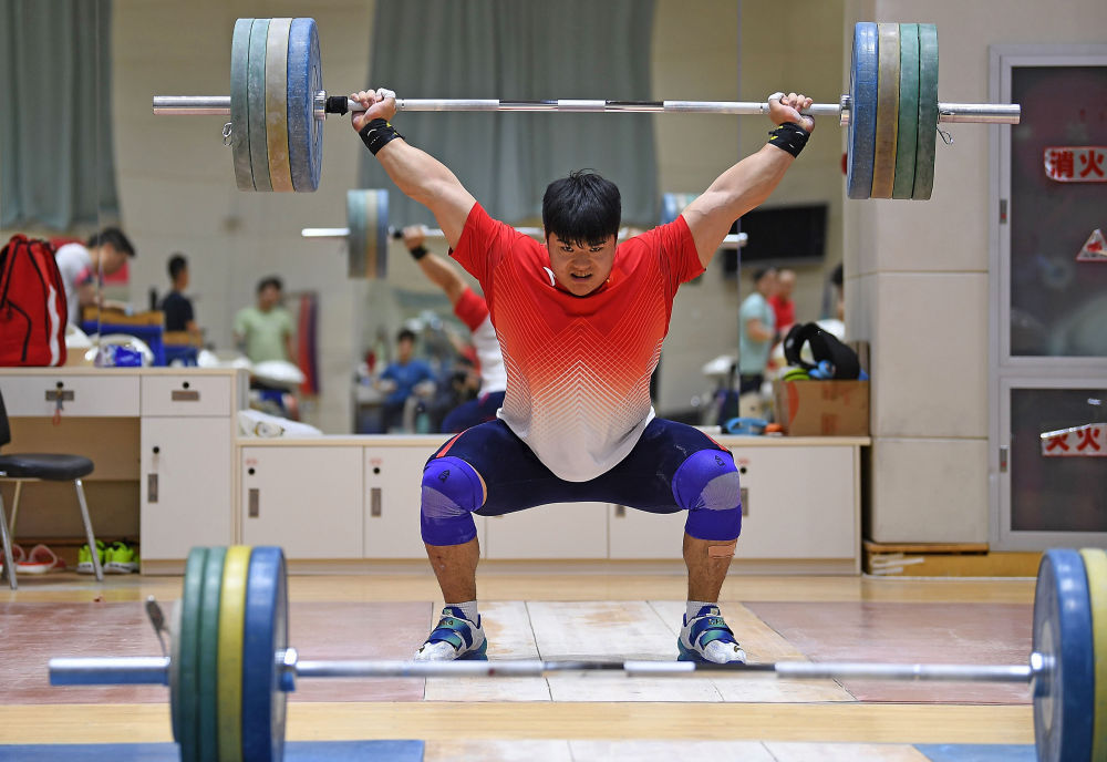 巴黎奥运预备式|国家举重队举行媒体公开课