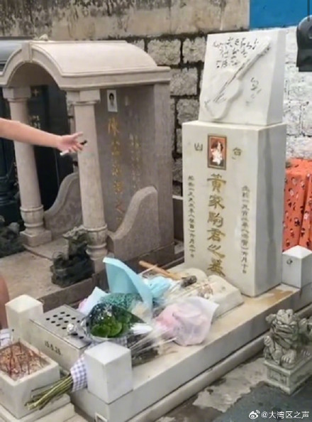 黄家驹墓碑遭涂污 香港警方拘捕两人 黄家驹墓碑遭涂污 香港警方拘捕两人