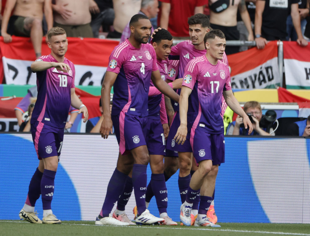 欧锦赛 | 德国队“妖艳”粉紫球衣热卖的背后