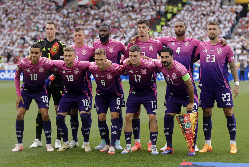 欧锦赛 | 德国队“妖艳”粉紫球衣热卖的背后