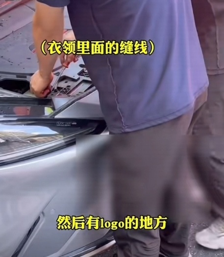 杭州一网约车起火后厂家员工反穿衣服当街盖车衣抠车标，北汽极狐致歉：以后杜绝