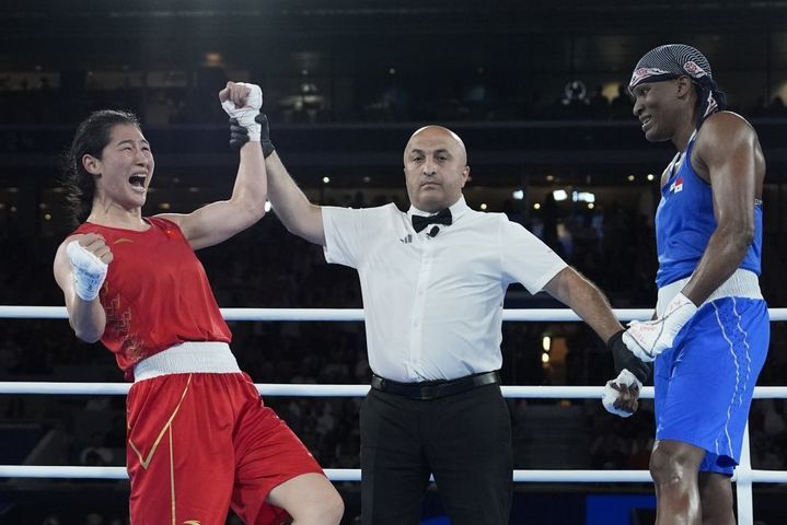 新闻分析：中国女子拳击为何金牌井喷？