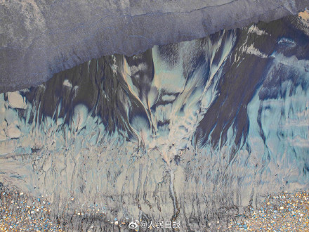 绝美！钱塘江退潮后现羽毛状纹理