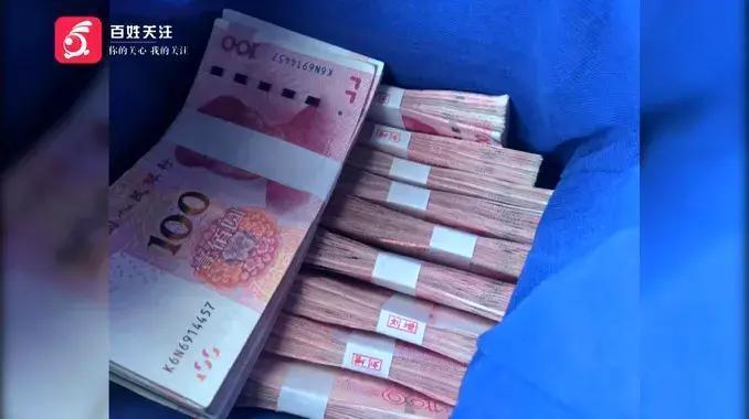 感动全城！女子把10万块遗忘店内，老板寸步不离守护，失主喊来了70人的舞狮队