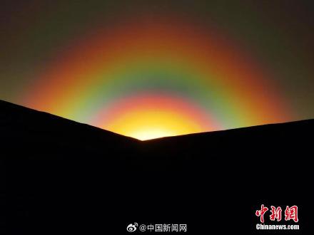梦幻感十足！额尔古纳现落日彩虹