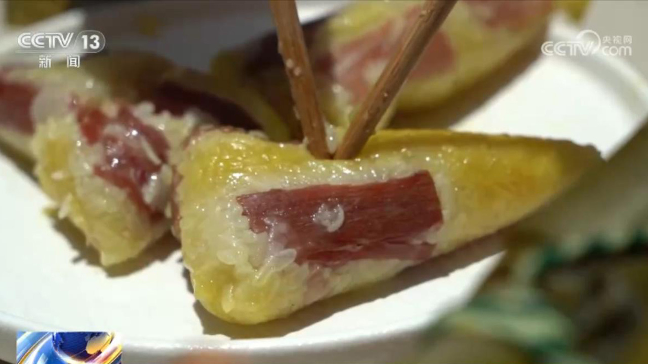 端午将至!龙舟竞渡展现速度激情 特色粽子满足食客味蕾 端午将至!龙舟竞渡展现速度激情 特色粽子满足食客味蕾