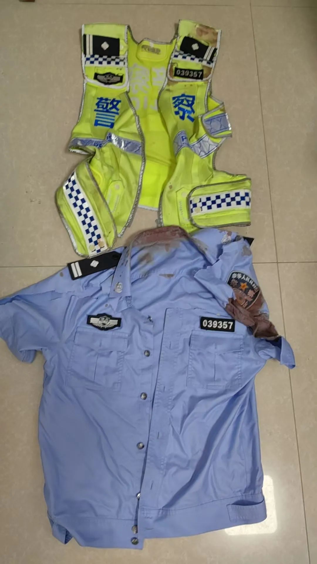 交警拦截冲卡轿车身受重伤!愿战友早日苏醒 交警拦截冲卡轿车身受重伤!愿战友早日苏醒