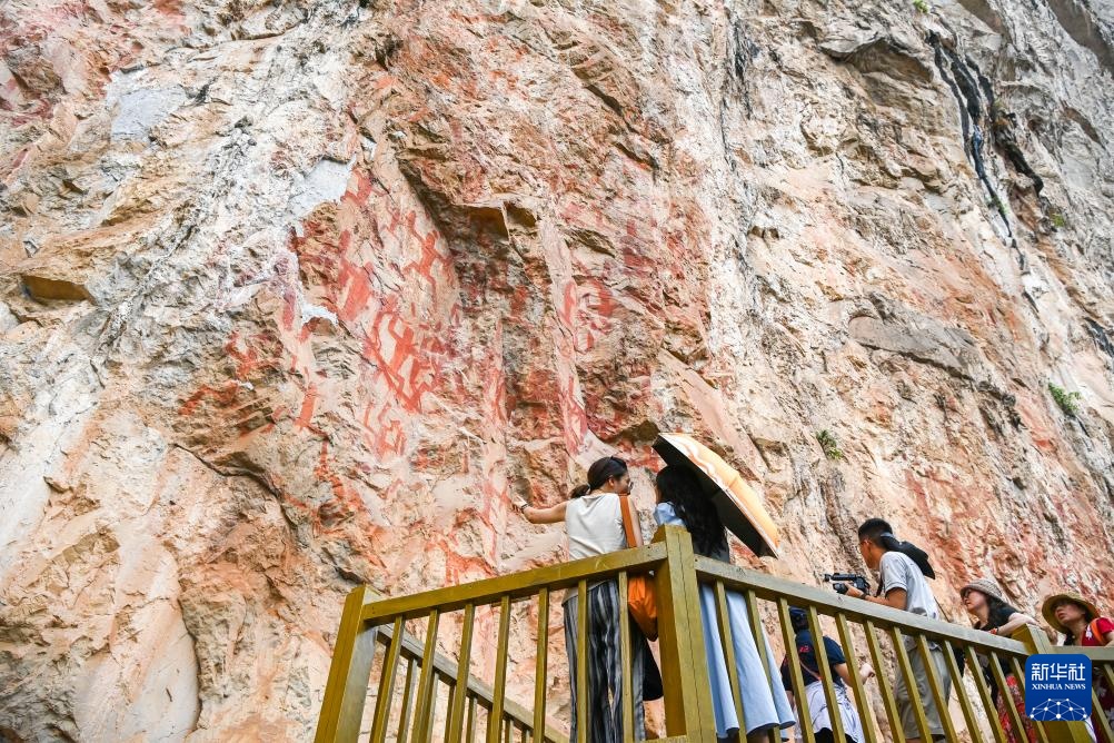 智绘中国·世遗镜鉴丨花山岩画:千年岩画焕新“彩” 智绘中国·世遗镜鉴丨花山岩画:千年岩画焕新“彩”