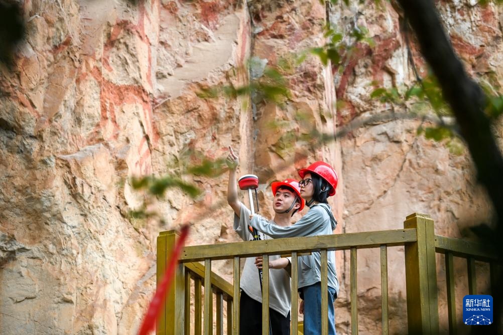 智绘中国·世遗镜鉴丨花山岩画:千年岩画焕新“彩” 智绘中国·世遗镜鉴丨花山岩画:千年岩画焕新“彩”