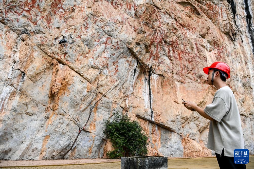 智绘中国·世遗镜鉴丨花山岩画:千年岩画焕新“彩” 智绘中国·世遗镜鉴丨花山岩画:千年岩画焕新“彩”