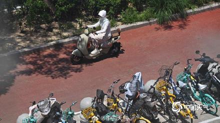 38℃！北京高温橙色预警中 看街头防暑众生相