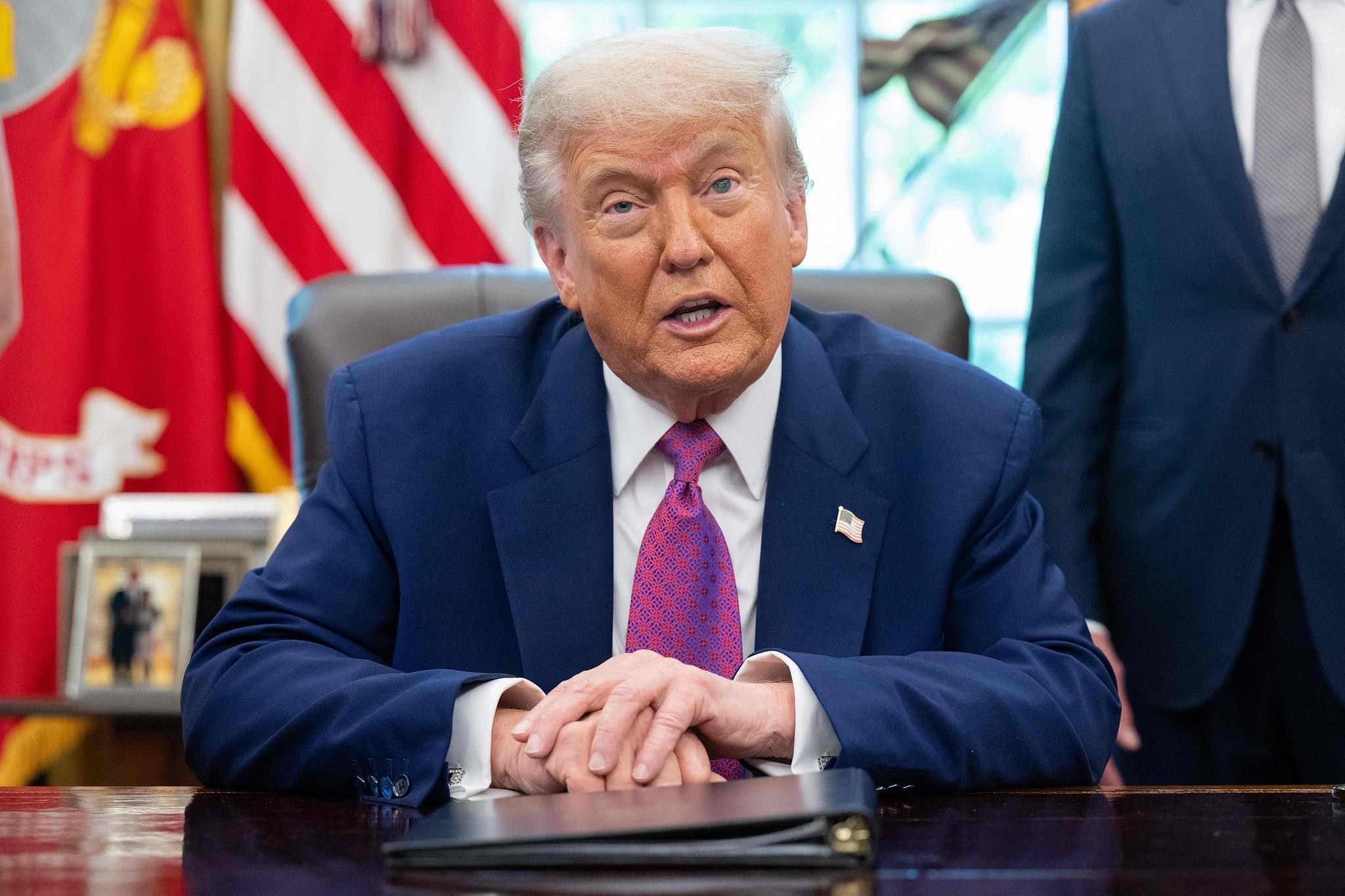 民调显示美国总统特朗普支持率跌至新低 民调显示美国总统特朗普支持率跌至新低