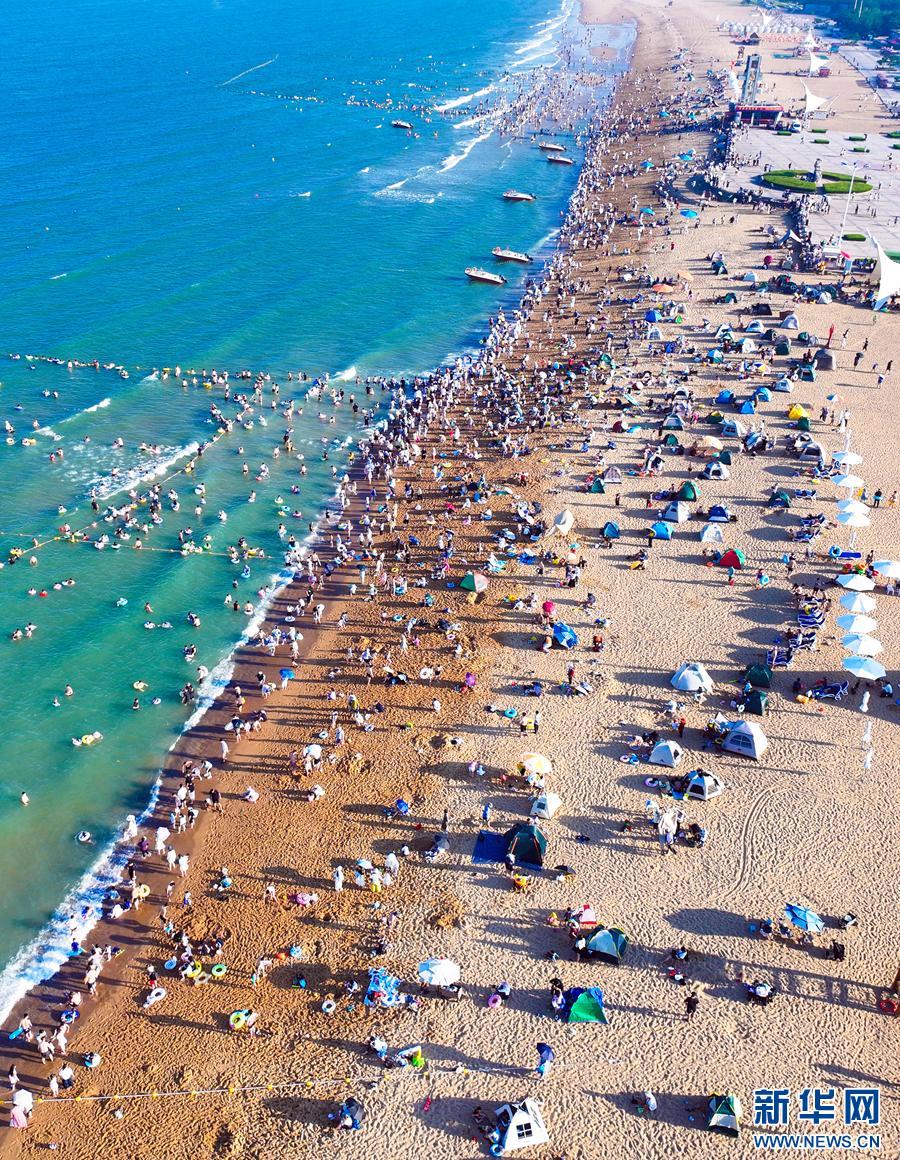 山东日照:海滨城市奏响避暑狂欢曲 山东日照:海滨城市奏响避暑狂欢曲