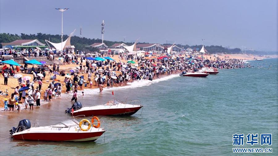 山东日照:海滨城市奏响避暑狂欢曲 山东日照:海滨城市奏响避暑狂欢曲