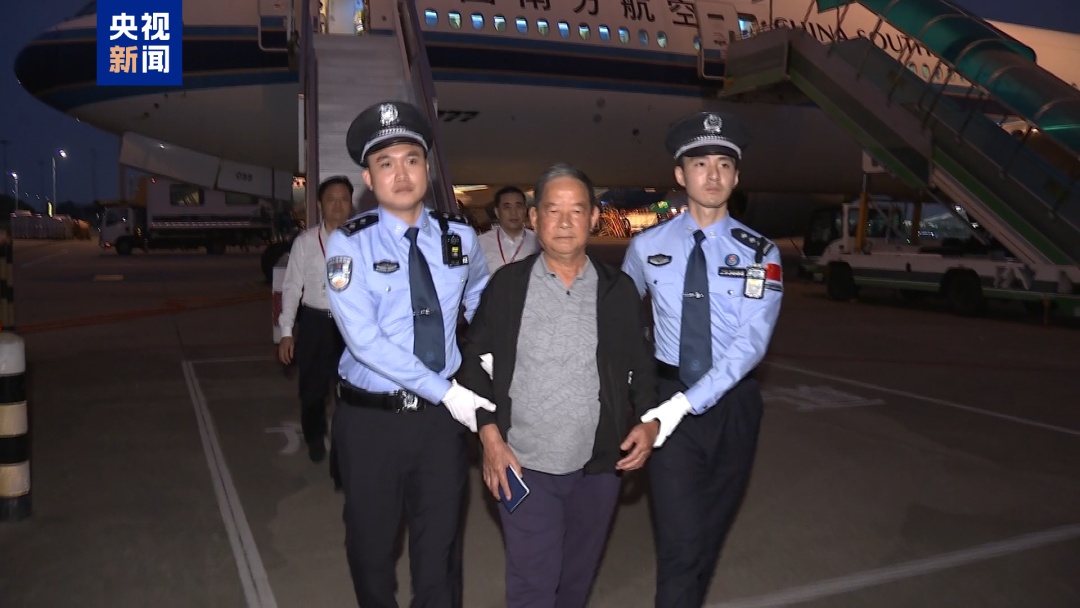 梁锦文回国投案